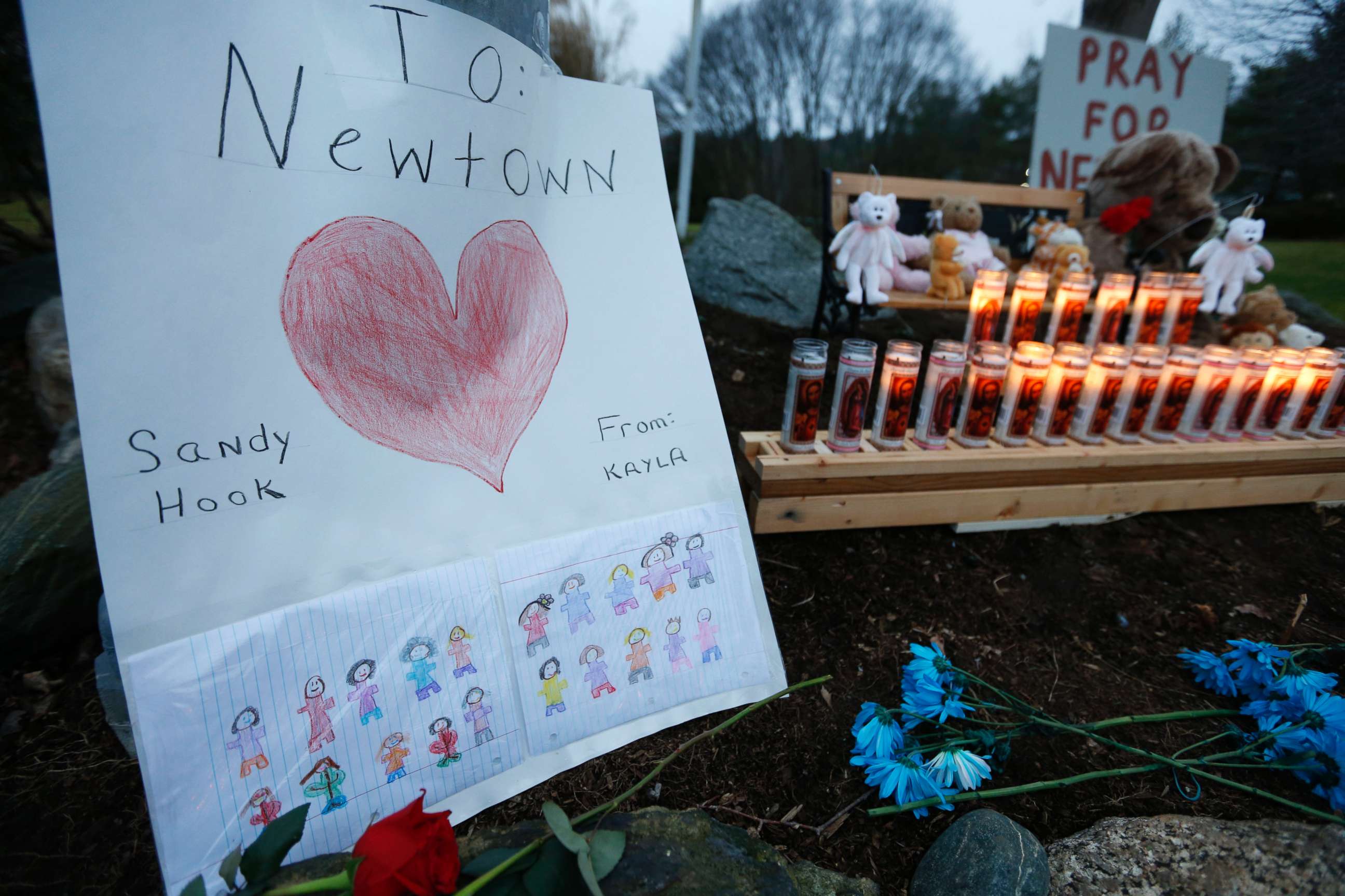 PHOTO: A child's message rests with a memorial for shooting victims, Dec. 16, 2012, in Newtown, Conn.