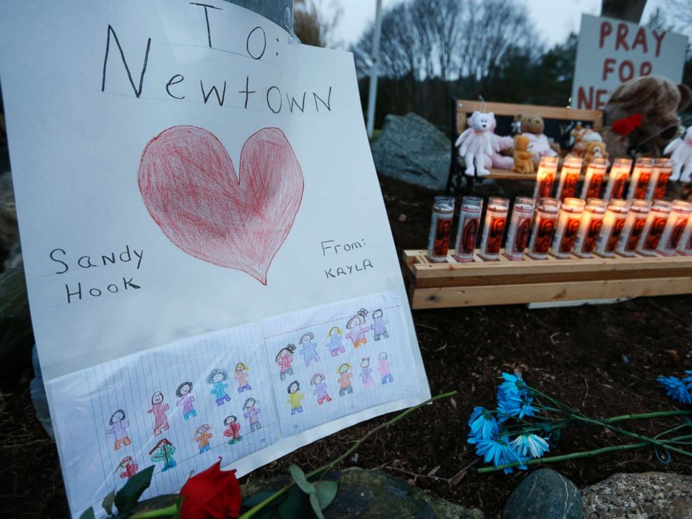 PHOTO: A childs message rests with a memorial for shooting victims, Dec. 16, 2012, in Newtown, Conn.