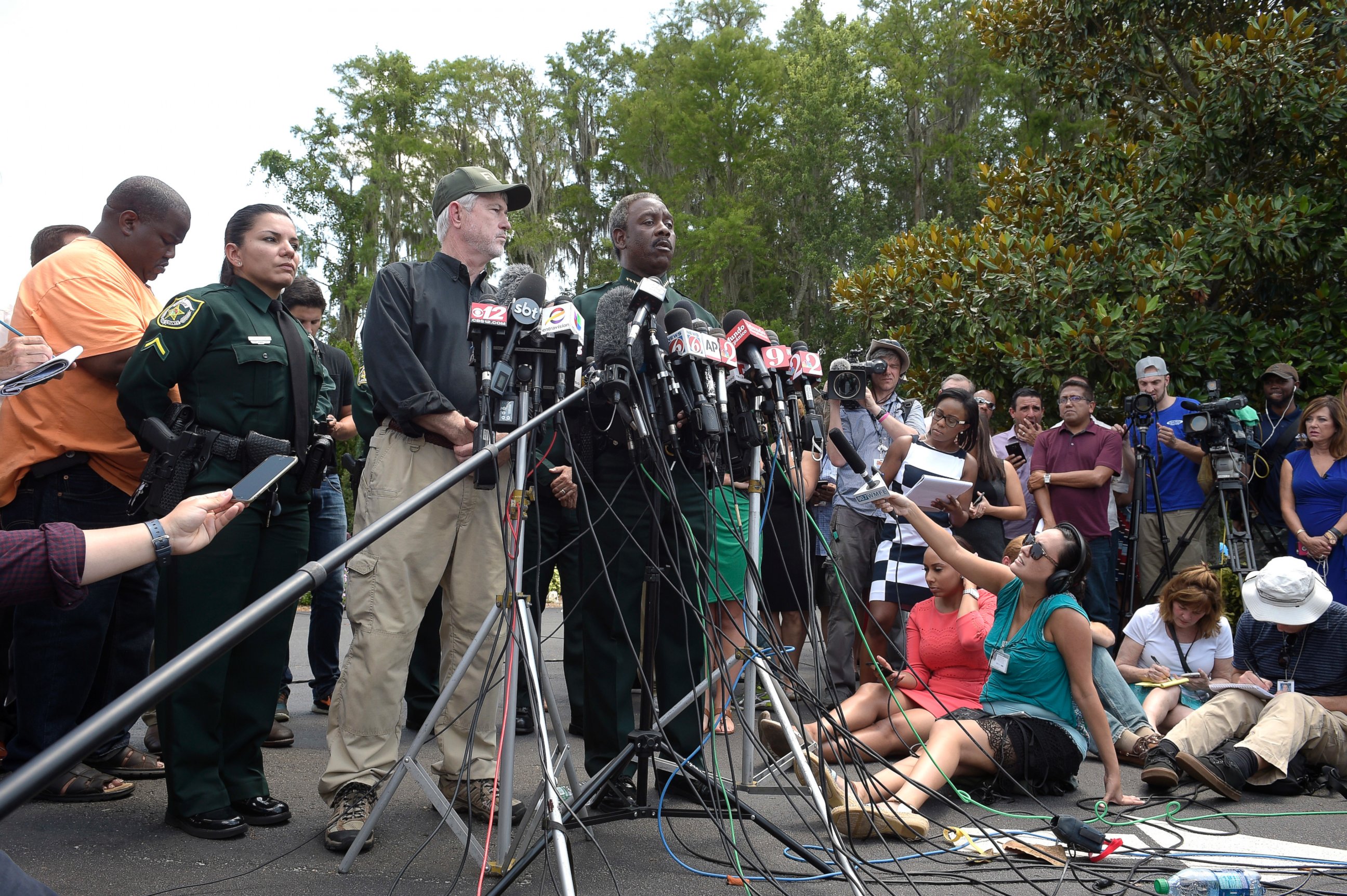 PHOTO: Nick Wiley, executive director of the Florida Fish & Wildlife Conservation Commission, left, and Orange County Sheriff Jerry Demings answer questions from reporters during a news conference June 15, 2016, in Lake Buena Vista, Florida. 