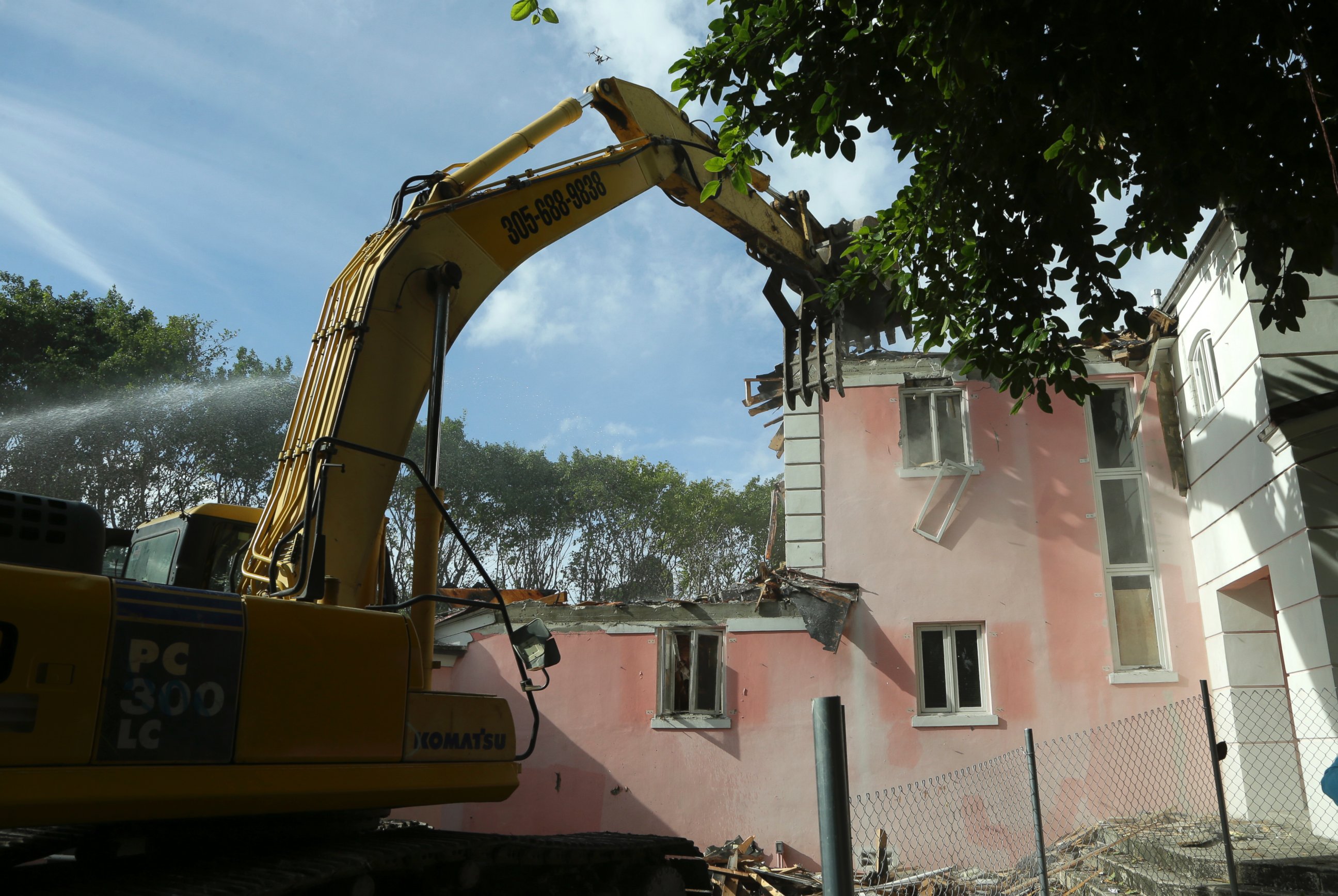 PHOTO:A bulldozer demolishes the waterfront mansion formerly owned by Colombian drug lord Pablo Escobar, Jan. 19, 2016, in Miami. 