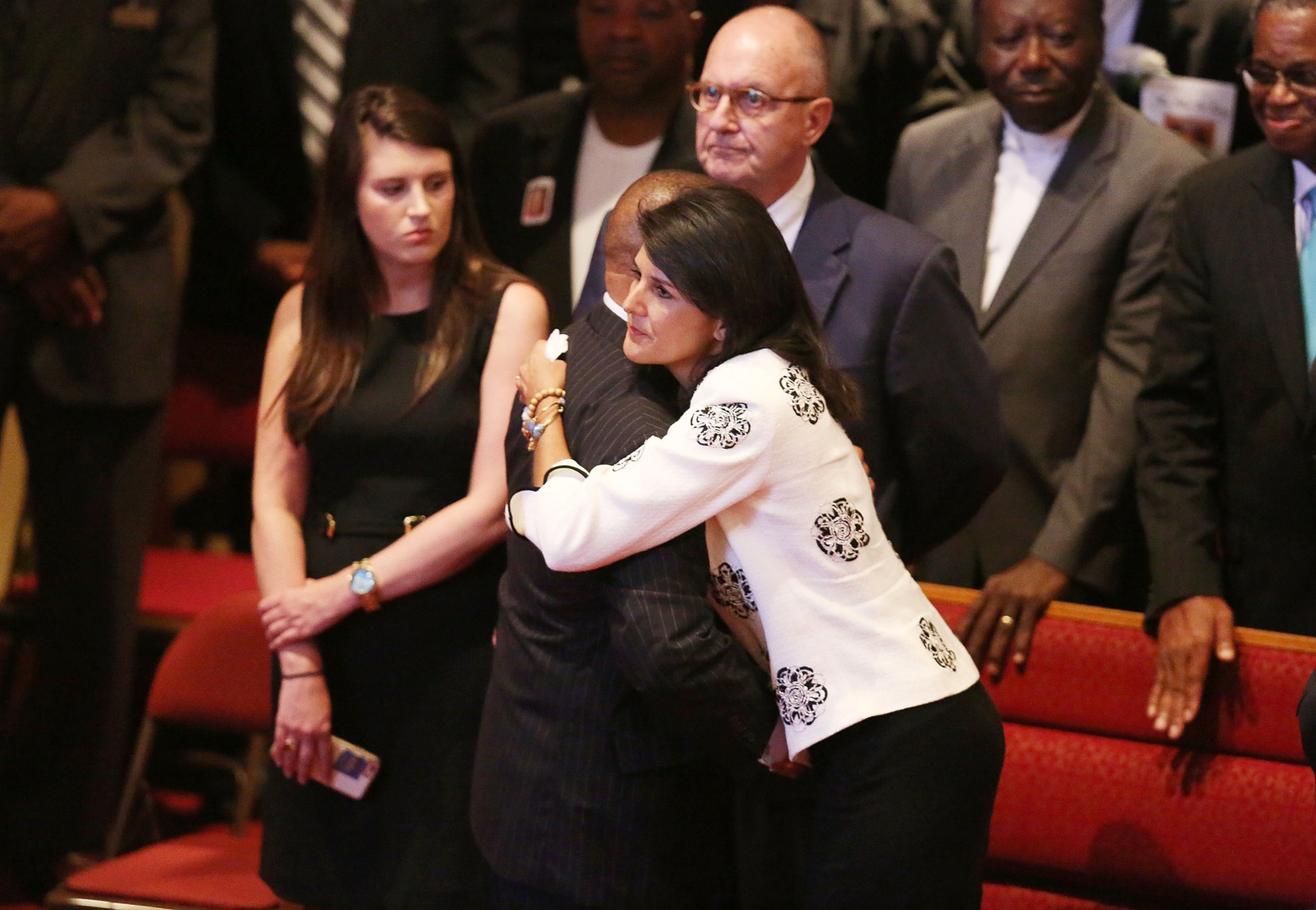 PHOTO: South Carolina Gov. Nikki Haley is hugged during the funeral of Ethel Lance, who was one of nine victims of a mass shooting at the Emanuel African Methodist Episcopal Church, June 25, 2015, in North Charleston, S.C. 