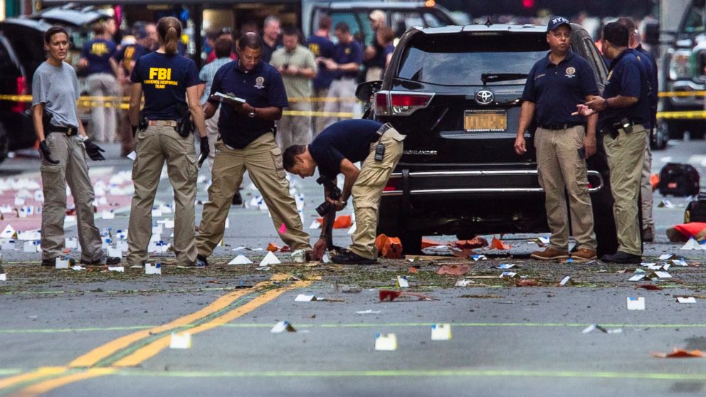 PHOTO: Members of the Federal Bureau of Investigation carry on investigations at the scene of Saturday's explosion on West 23rd Street and Sixth Avenue in Manhattan's Chelsea neighborhood, New York, Sept. 18, 2016.