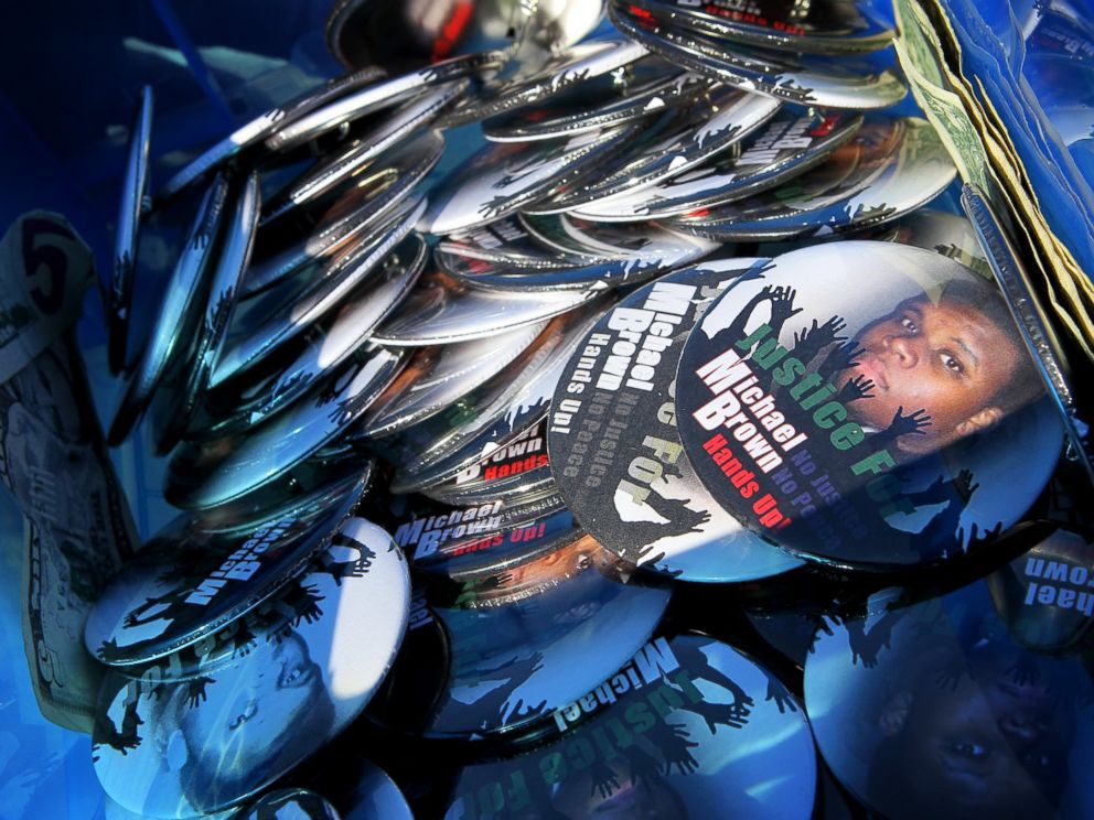 PHOTO: Buttons that state Justice for Michael Brown are piled together in a box in Ferguson, Mo., Aug. 13, 2014.