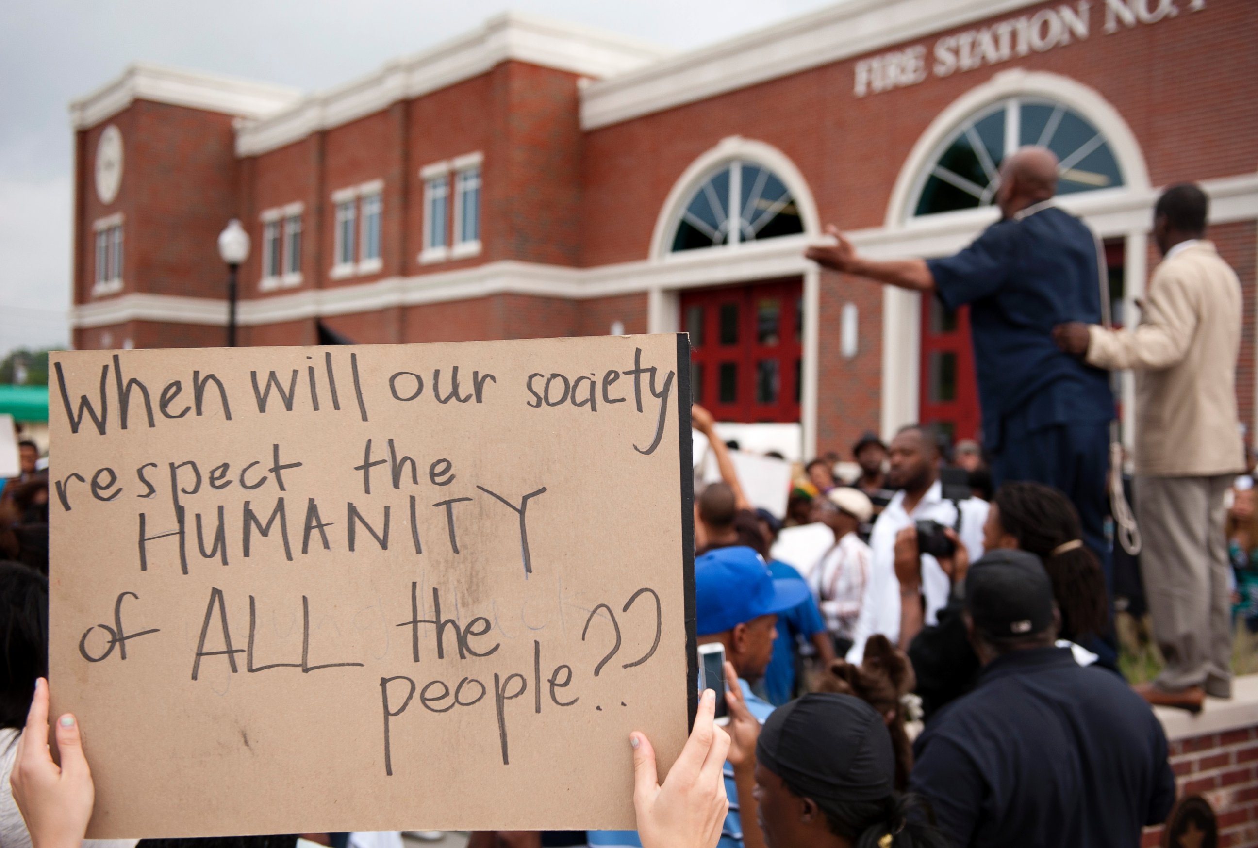 PHOTO: Protestors rally Sunday, Aug. 10, 2014 to protest the shooting of Michael Brown, 18, by police in Ferguson, Mo.