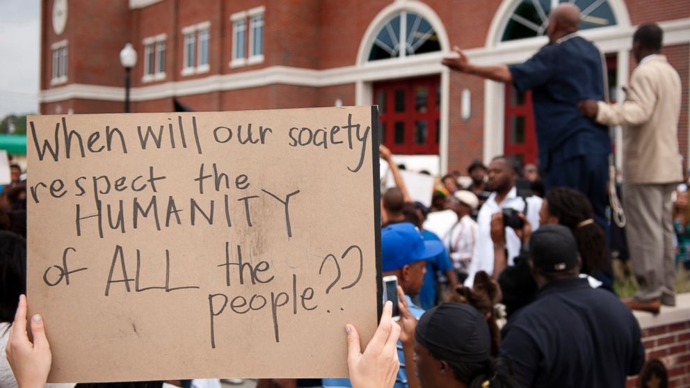 PHOTO: Protestors rally Sunday, Aug. 10, 2014 to protest the shooting of Michael Brown, 18, by police in Ferguson, Mo.