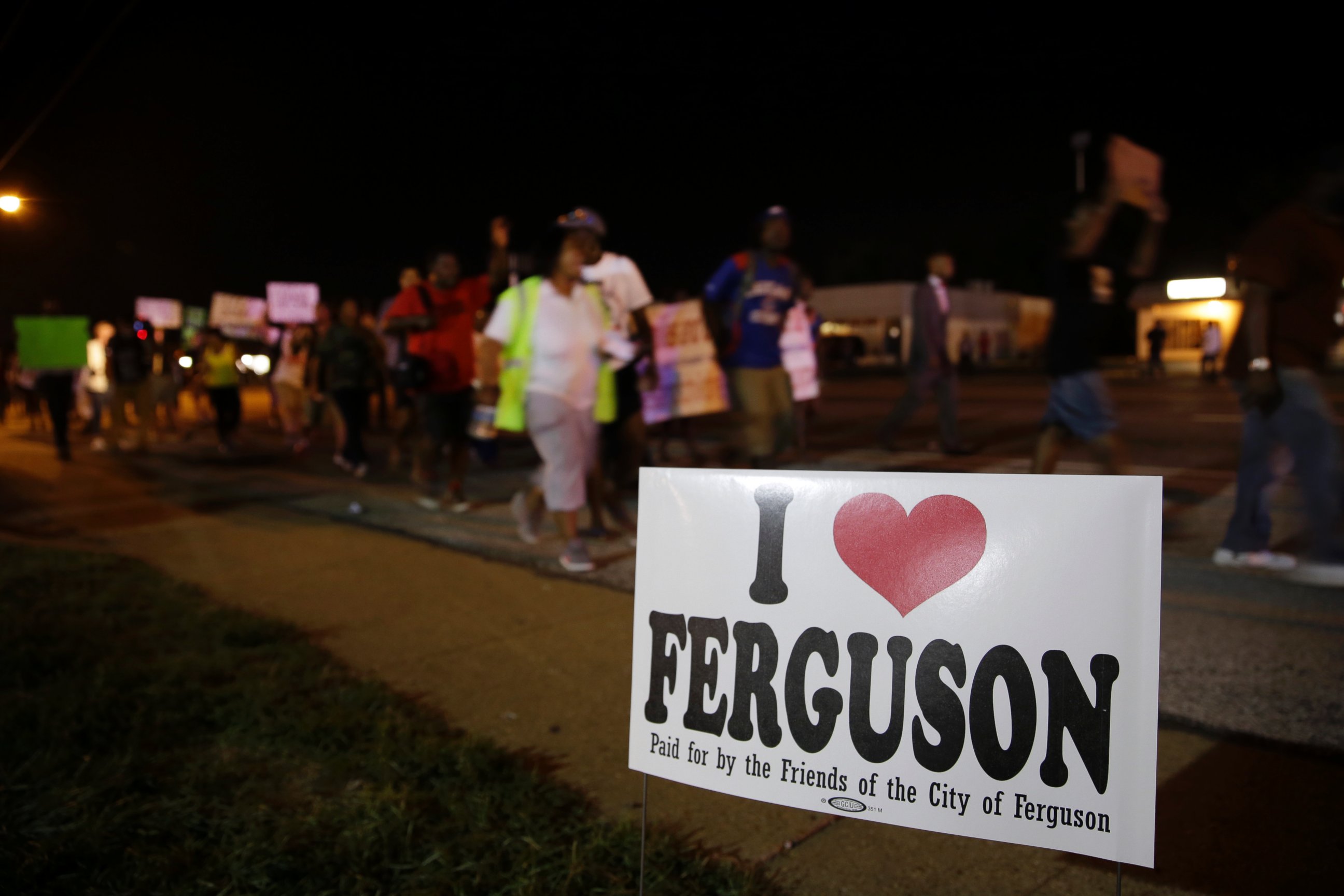 PHOTO: Protesters march, Aug. 21, 2014, in Ferguson, Mo.