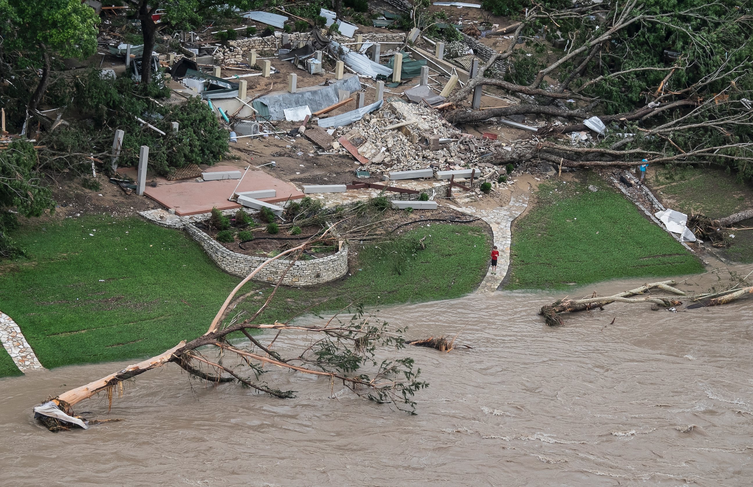 PHOTO: A home on the Blanco River was taken off its foundation after heavy overnight rain caused flash flooding in Wimberley, Texas, May 24, 2015.