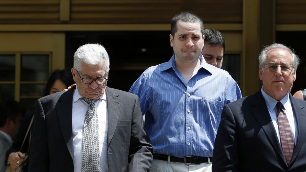 PHOTO: GIlberto Valle, center, leaves Manhattan federal court in New York in New York, July 1, 2014. A federal judge overturned the conviction of the former New York City police officer accused of plotting to kidnap, kill and eat young women.
