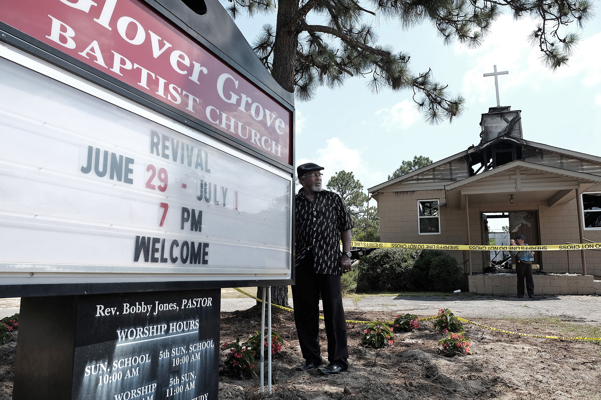 PHOTO: Glover Grove Baptist Church Pastor Bobby Jones stands outside the church that was destroyed by a fire, June 26, 2015,  in Warrenville, S.C.