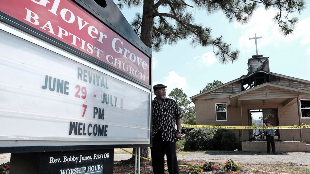 PHOTO: Glover Grove Baptist Church Pastor Bobby Jones stands outside the church that was destroyed by a fire, June 26, 2015,  in Warrenville, S.C.