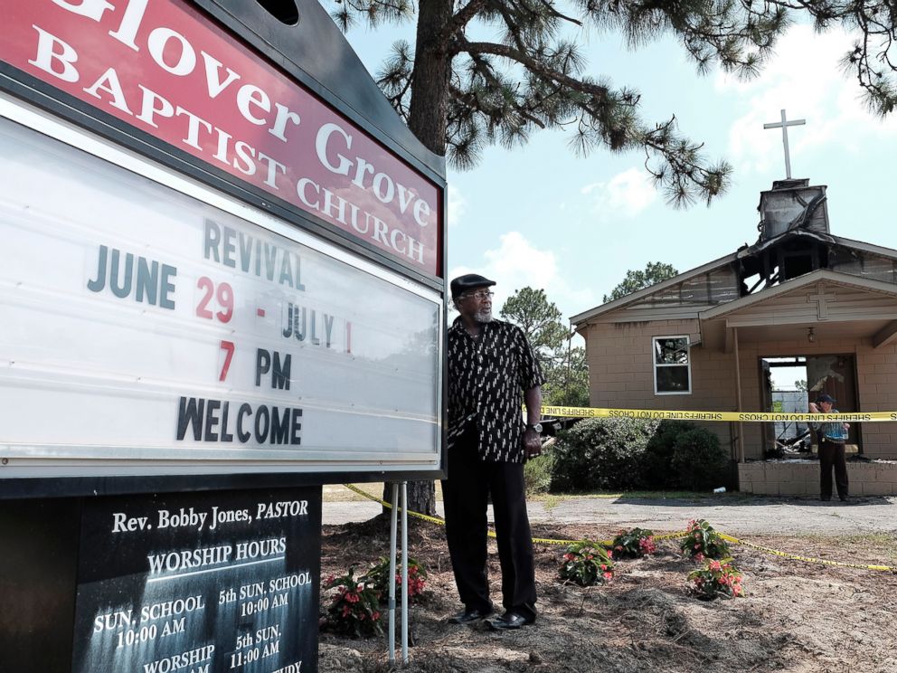 PHOTO: Glover Grove Baptist Church Pastor Bobby Jones stands outside the church that was destroyed by a fire, June 26, 2015, in Warrenville, S.C.