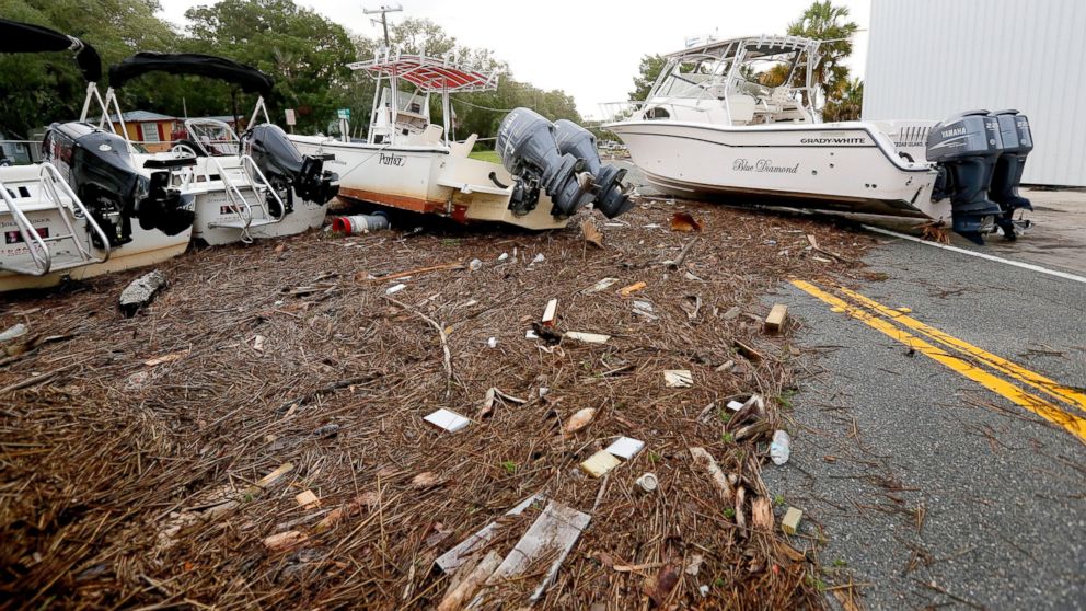 Debris and boats are scattered across the road after Hurricane Hermine passed the area, Sept. 2, 2016, in Steinhatchee, Florida.