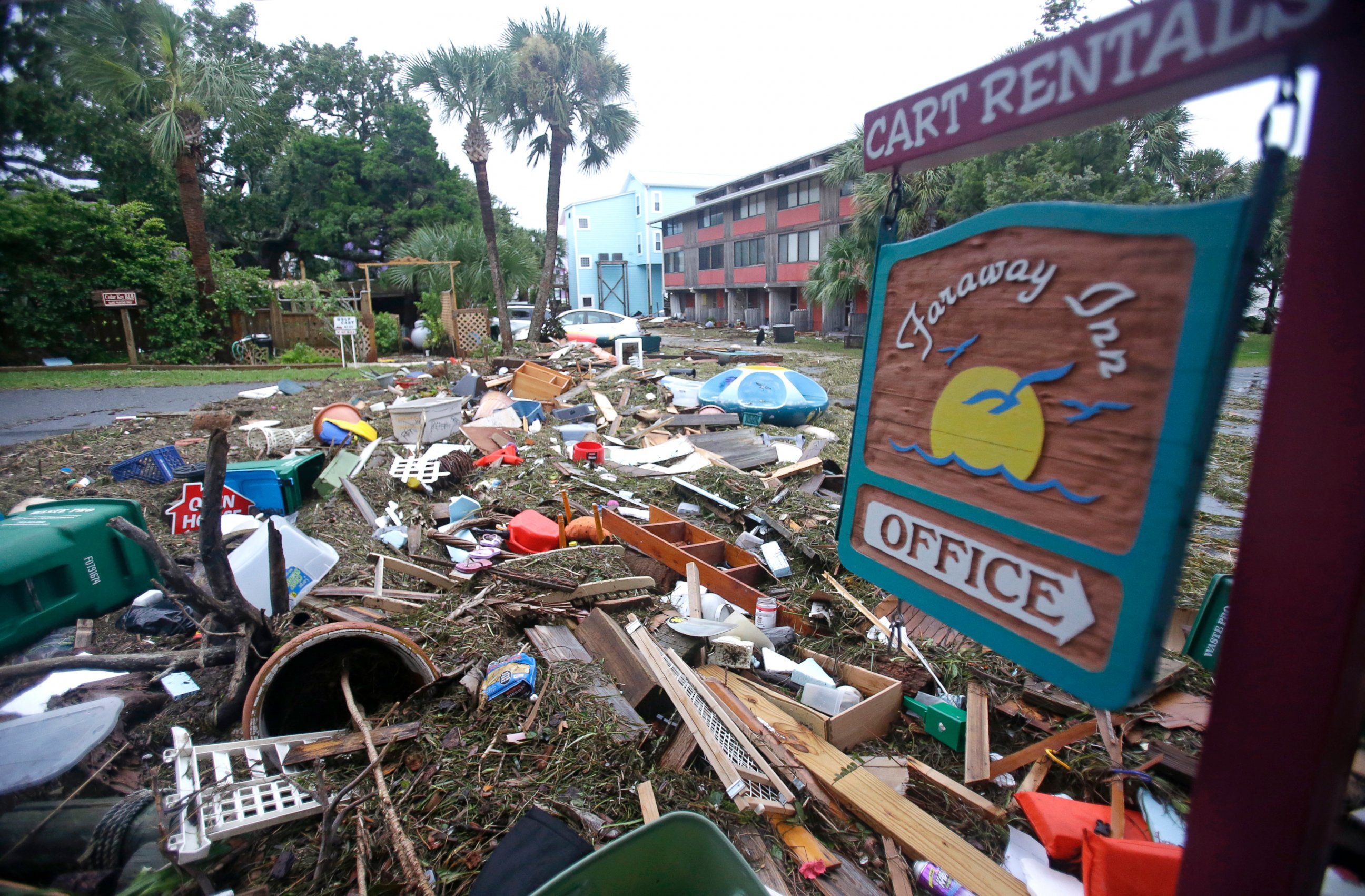 PHOTO: A street is blocked from debris washed up from the tidal surge of Hermine, Sept. 2, 2016, in Cedar Key, Florida.