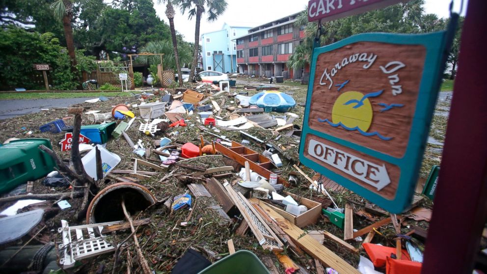 PHOTO: A street is blocked from debris washed up from the tidal surge of Hermine, Sept. 2, 2016, in Cedar Key, Florida.