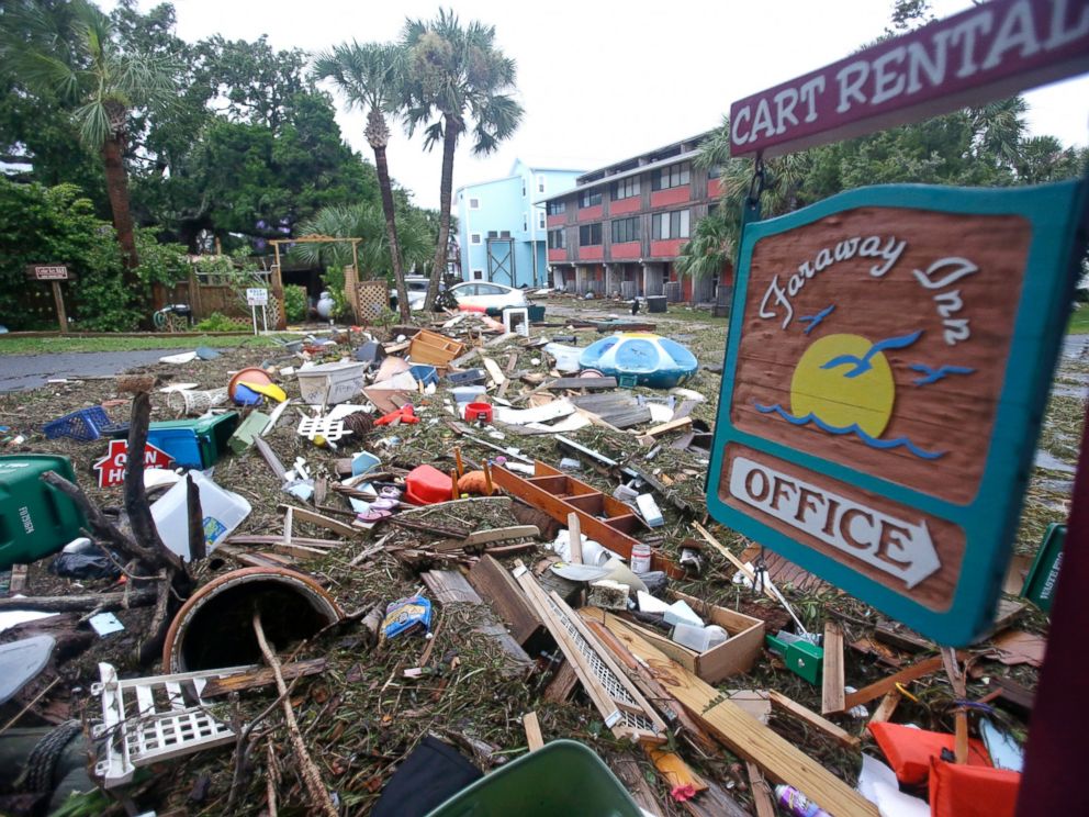 PHOTO: A street is blocked from debris washed up from the tidal surge of Hermine, Sept. 2, 2016, in Cedar Key, Florida.