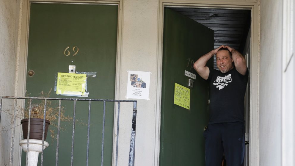 PHOTO: Jonathan Levine stands in his doorway after learning he would have to evacuate his oceanside apartment Jan. 25, 2016, in Pacifica, Calif. His apartment building, perched atop a coastal bluff, is in danger of falling into the ocean.
