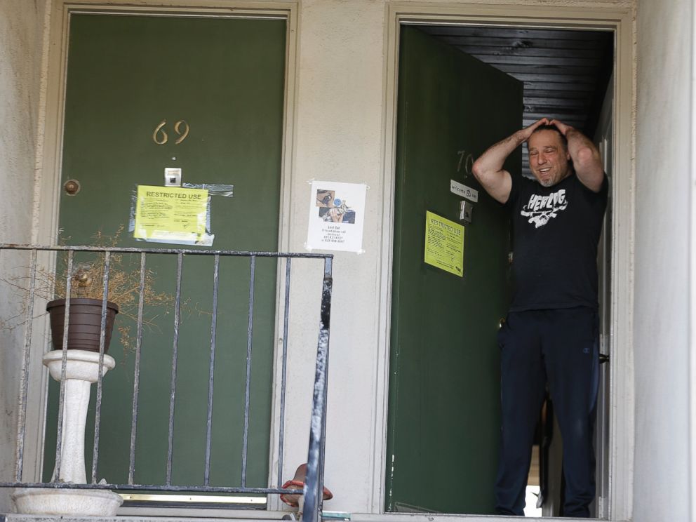 PHOTO: Jonathan Levine stands in his doorway after learning he would have to evacuate his oceanside apartment Jan. 25, 2016, in Pacifica, Calif. His apartment building, perched atop a coastal bluff, is in danger of falling into the ocean.