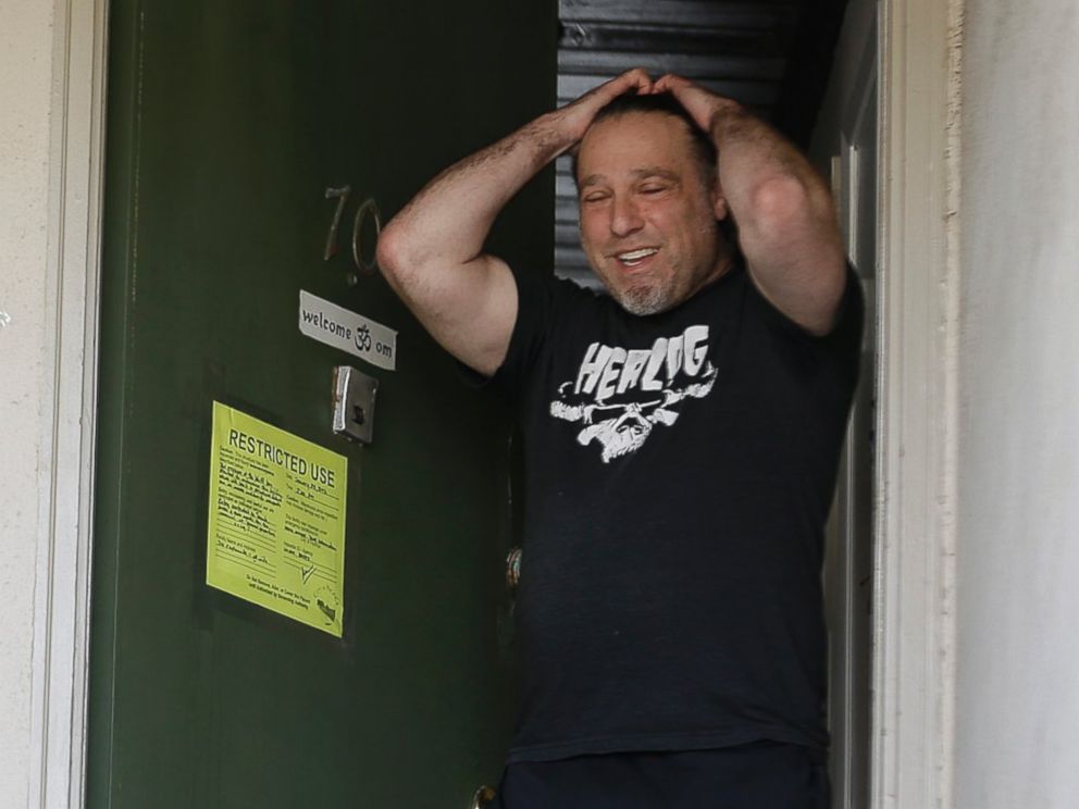 PHOTO: Jonathan Levine stands in his doorway after learning he would have to evacuate his oceanside apartment Jan. 25, 2016, in Pacifica, Calif. His apartment building, perched atop a coastal bluff, is in danger of falling into the ocean.  