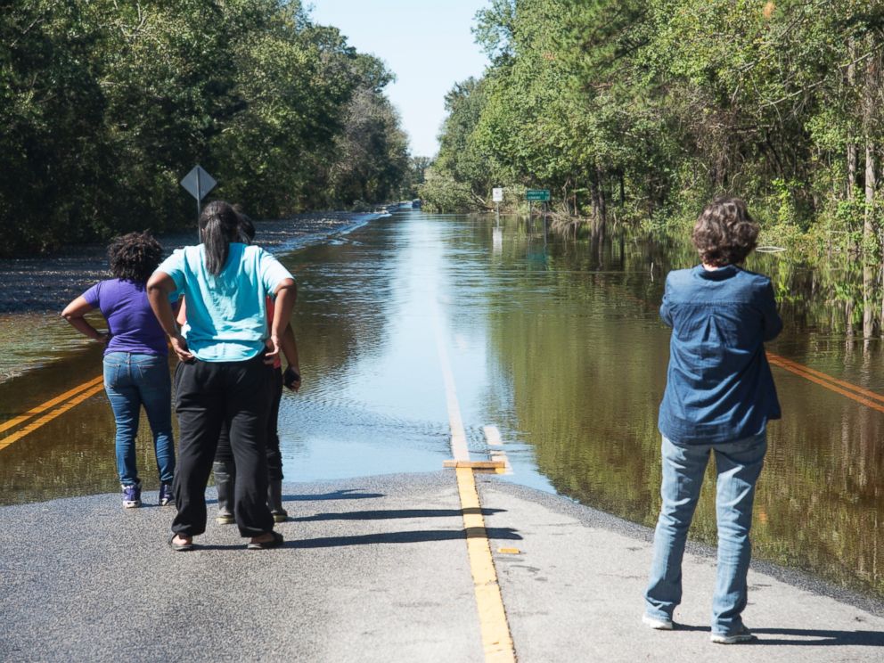 PHOTO: Floodwaters caused by rain from Hurricane Matthew block NC Highway 41 west at the Bladen and Robeson County line outside of Lumberton, North Carolina, Oct. 10, 2016.