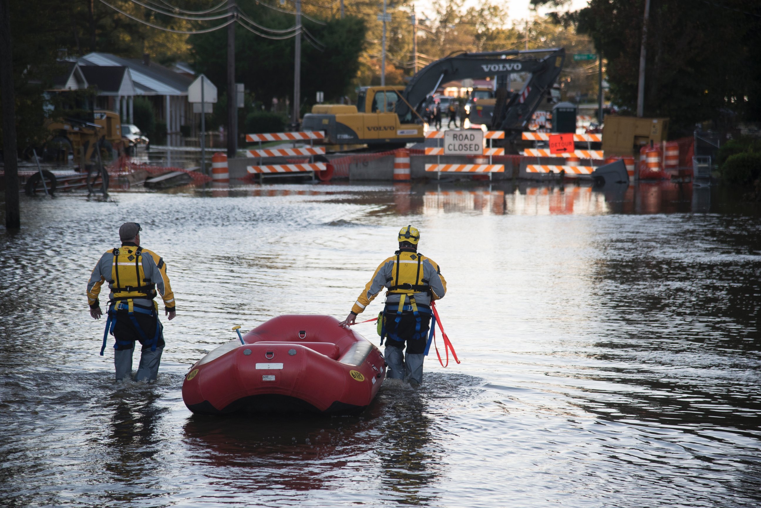 PHOTO: A swift water rescue team down a street covered by floodwaters caused by rain from Hurricane Matthew, on Oct. 10, 2016, in Lumberton, North Carolina. 