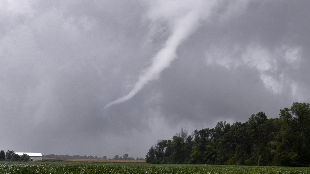 PHOTO: A funnel cloud near Van Buren, Indiana, moves east before breaking up as storms move through Grant County, Aug. 24, 2016. 