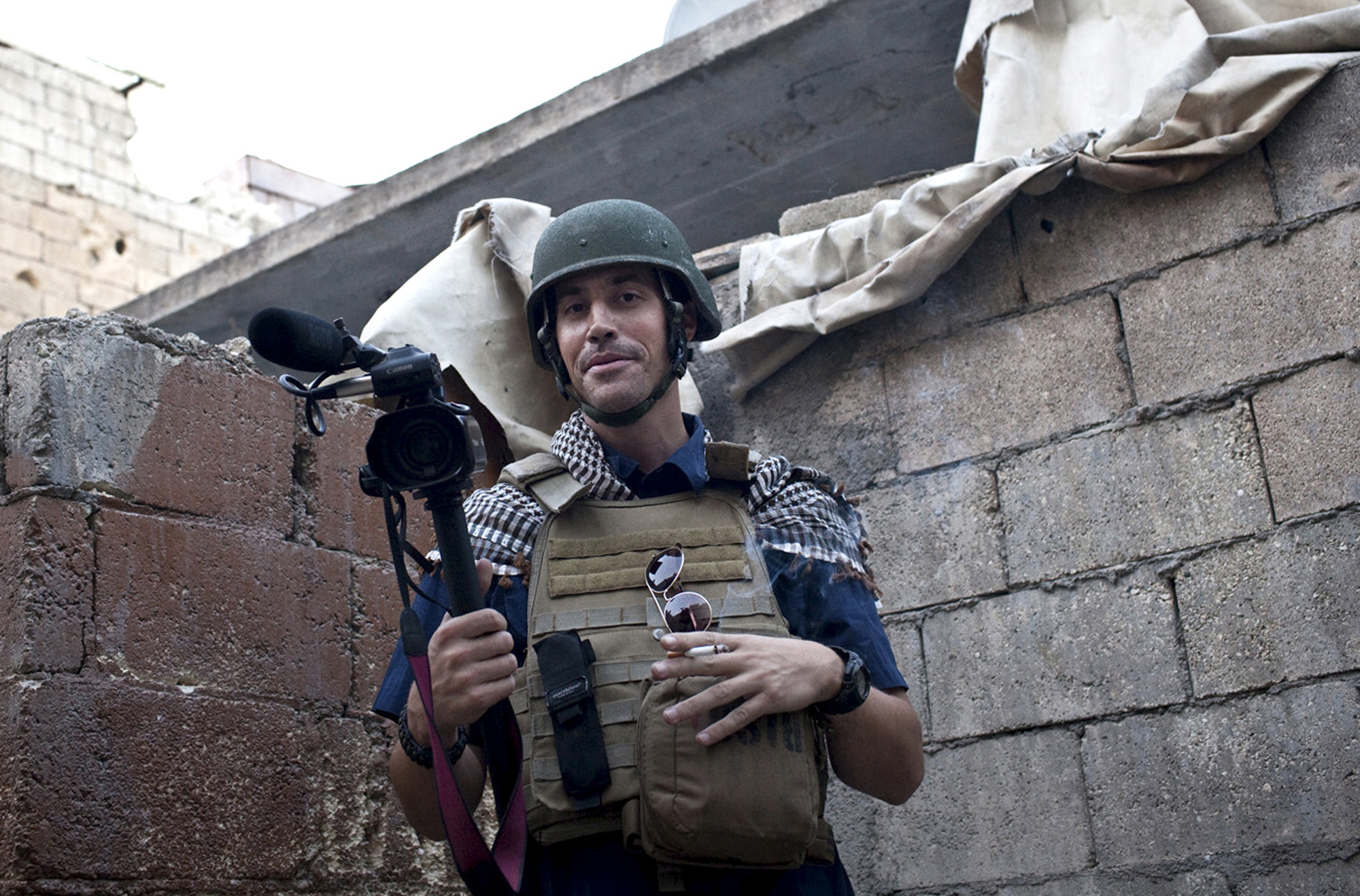 PHOTO: A November 2012 file photo shows journalist James Foley while covering the civil war in Aleppo, Syria. The Islamic State group released a video on Aug. 19, 2014, showing a jihadi beheading Foley, a 40-year-old journalist from Rochester, N.H.
