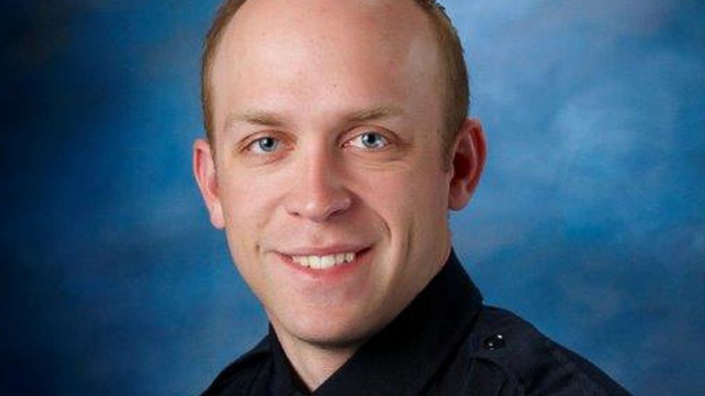 This undated photo released by Fargo Police Department shows Fargo police officer Jason Moszer.