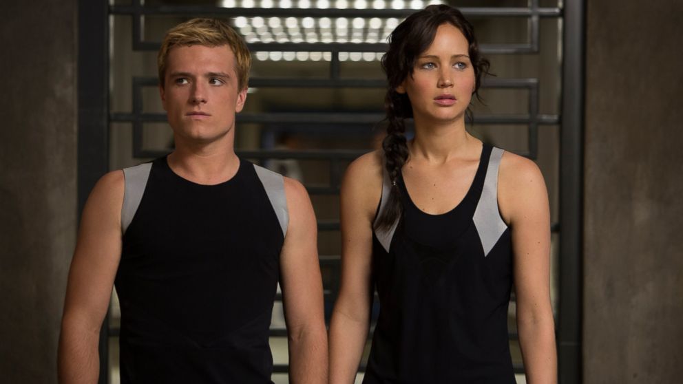 This image released by Lionsgate shows Josh Hutcherson as Peeta Mellark, left, and Jennifer Lawrence as Katniss Everdeen in a scene from "The Hunger Games: Catching Fire."