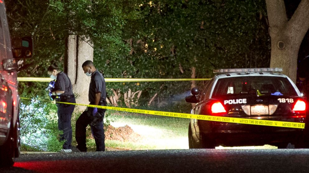 PHOTO: Authorities investigate the scene on Nov. 7, 2015, where District Judge Julie Kocurek was shot on Friday night in the driveway of her home in Austin, Texas. 