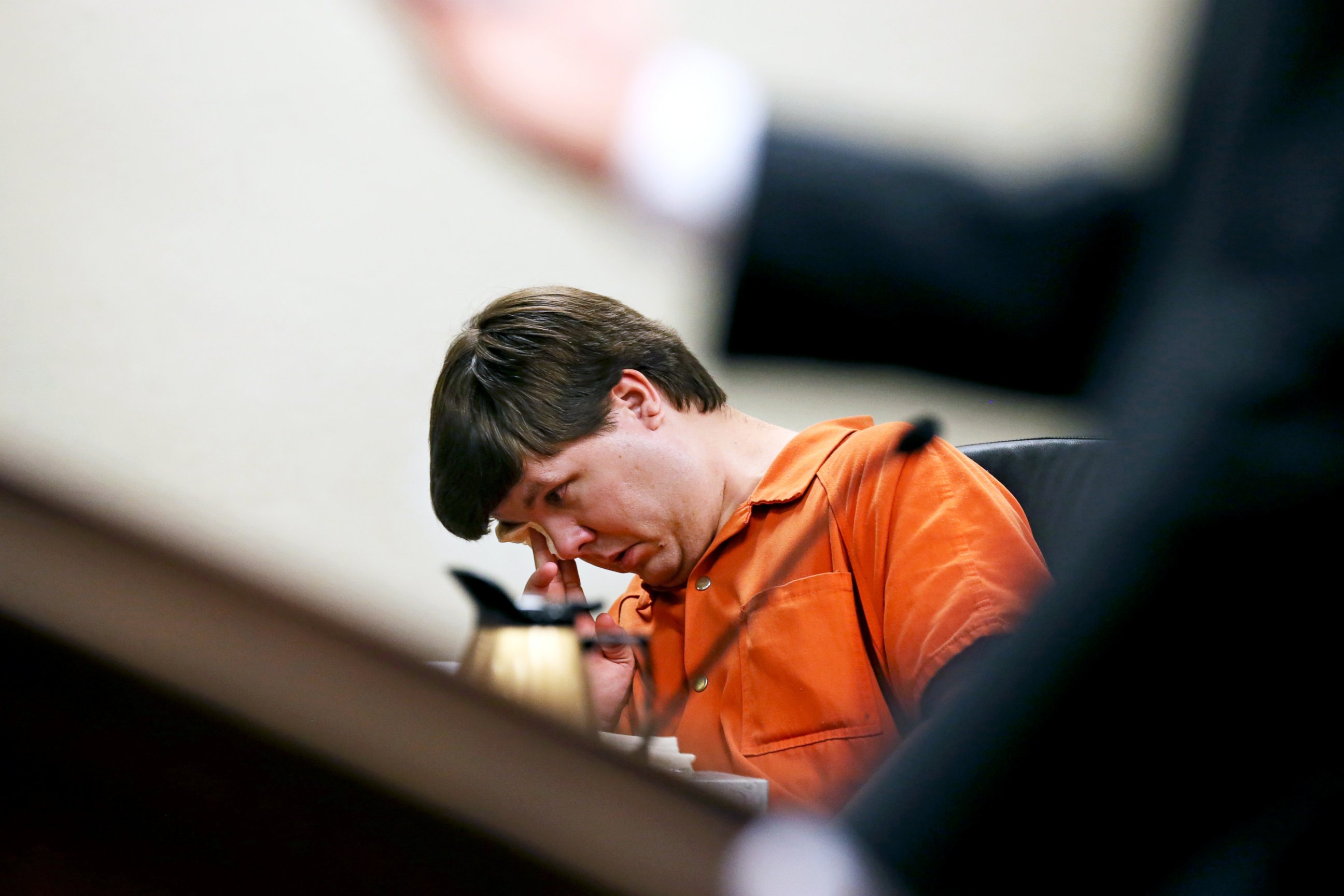 PHOTO: Justin Ross Harris, the father of a toddler who died after police say he was left in a hot car for about seven hours, wipes his eye as he sits during his bond hearing in Cobb County Magistrate Court, July 3, 2014, in Marietta, Ga. 