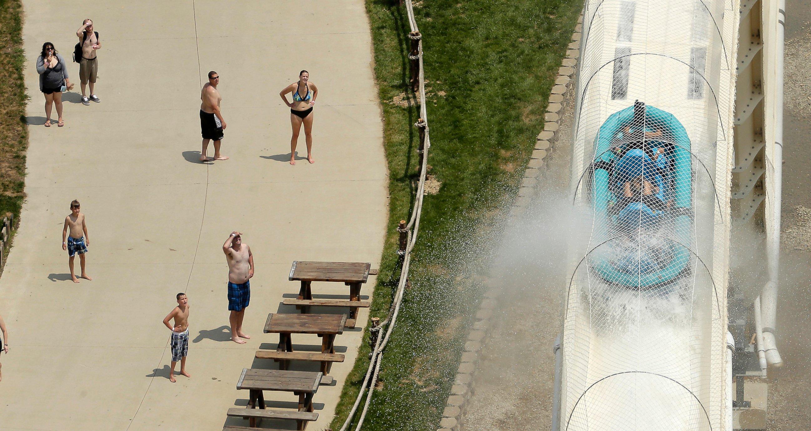 PHOTO: Riders are propelled by jets of water as they go over a hump while riding a water slide called "Verruckt" at Schlitterbahn Waterpark in Kansas City. 