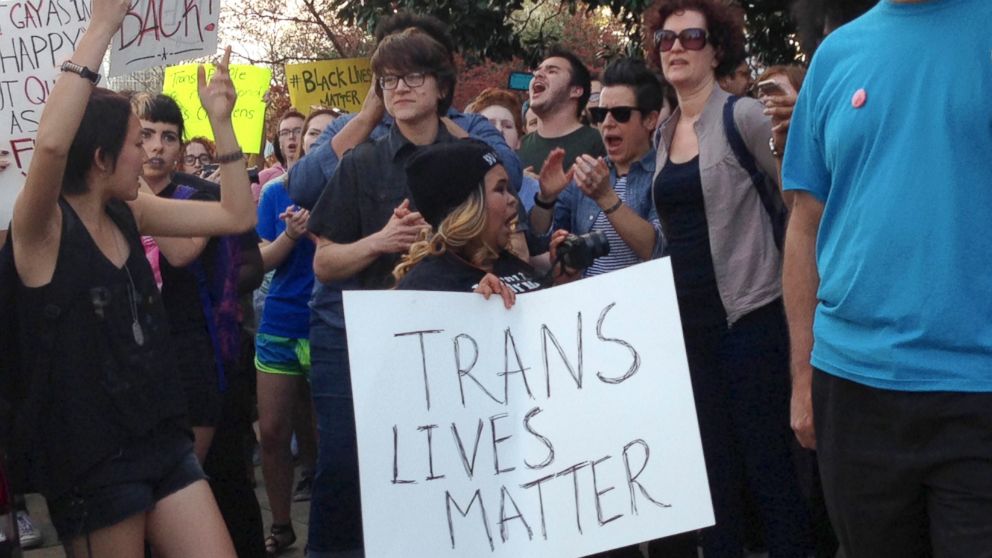 People protest outside the North Carolina Executive Mansion in Raleigh, N.C., March 24, 2016.  