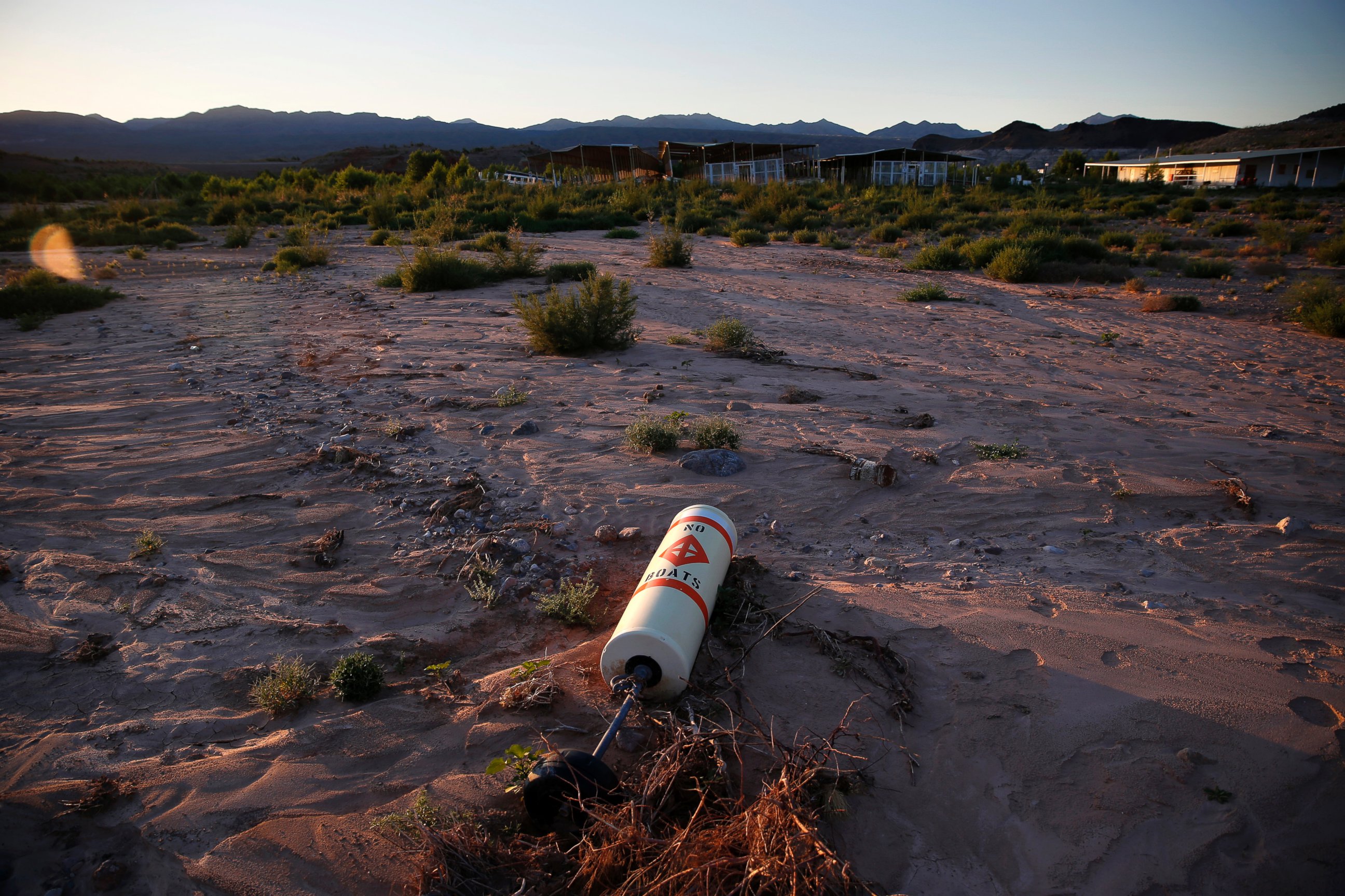 PHOTO: A buoy lies high and dry above the water line at the now defunct Echo Bay Marina in the Lake Mead National Recreation Area, May 19, 2016. Lake Mead's surface was at its lowest level Wednesday since the reservoir was created. 