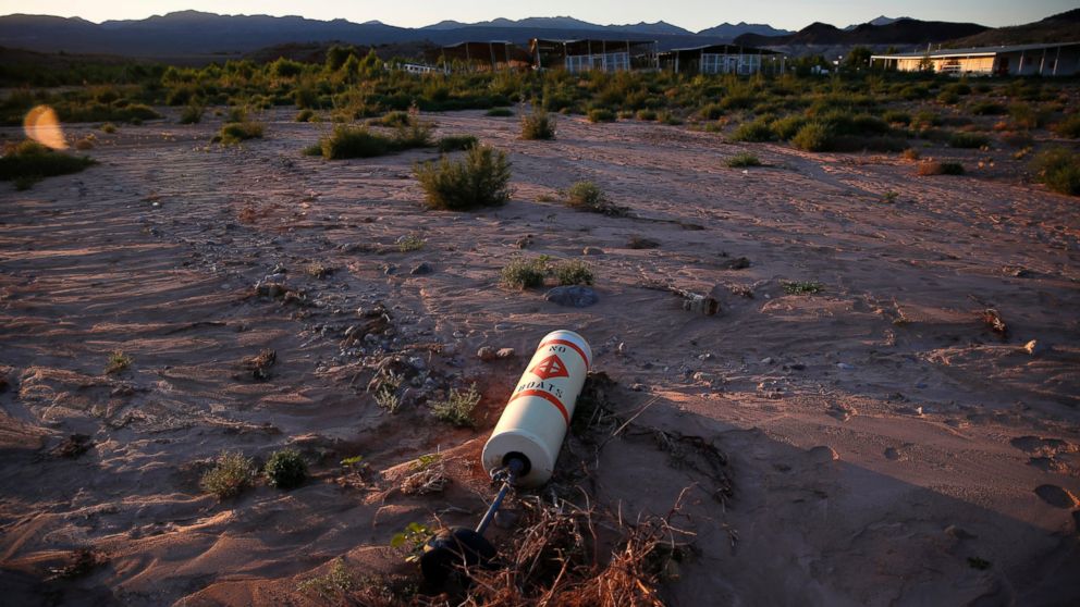 PHOTO: A buoy lies high and dry above the water line at the now defunct Echo Bay Marina in the Lake Mead National Recreation Area, May 19, 2016. Lake Mead's surface was at its lowest level Wednesday since the reservoir was created. 