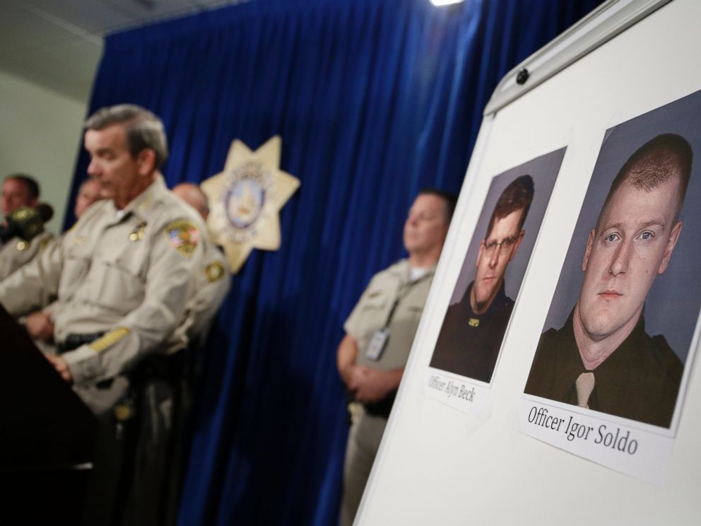 PHOTO: Sheriff Doug Gillespie, left, speaks at a news conference on the shooting of two Las Vegas Metropolitan Police Department officers, June 8, 2014 in Las Vegas.
