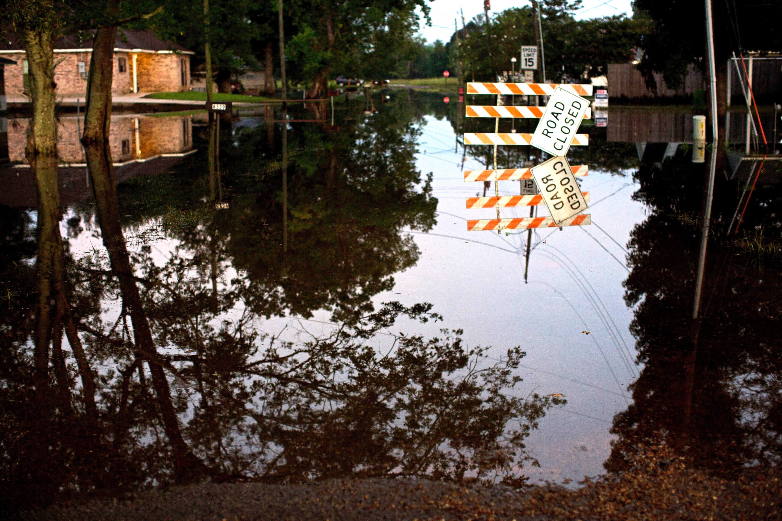 PHOTO: Standing water closes roads, Aug. 20, 2016, in Sorrento, Louisiana.