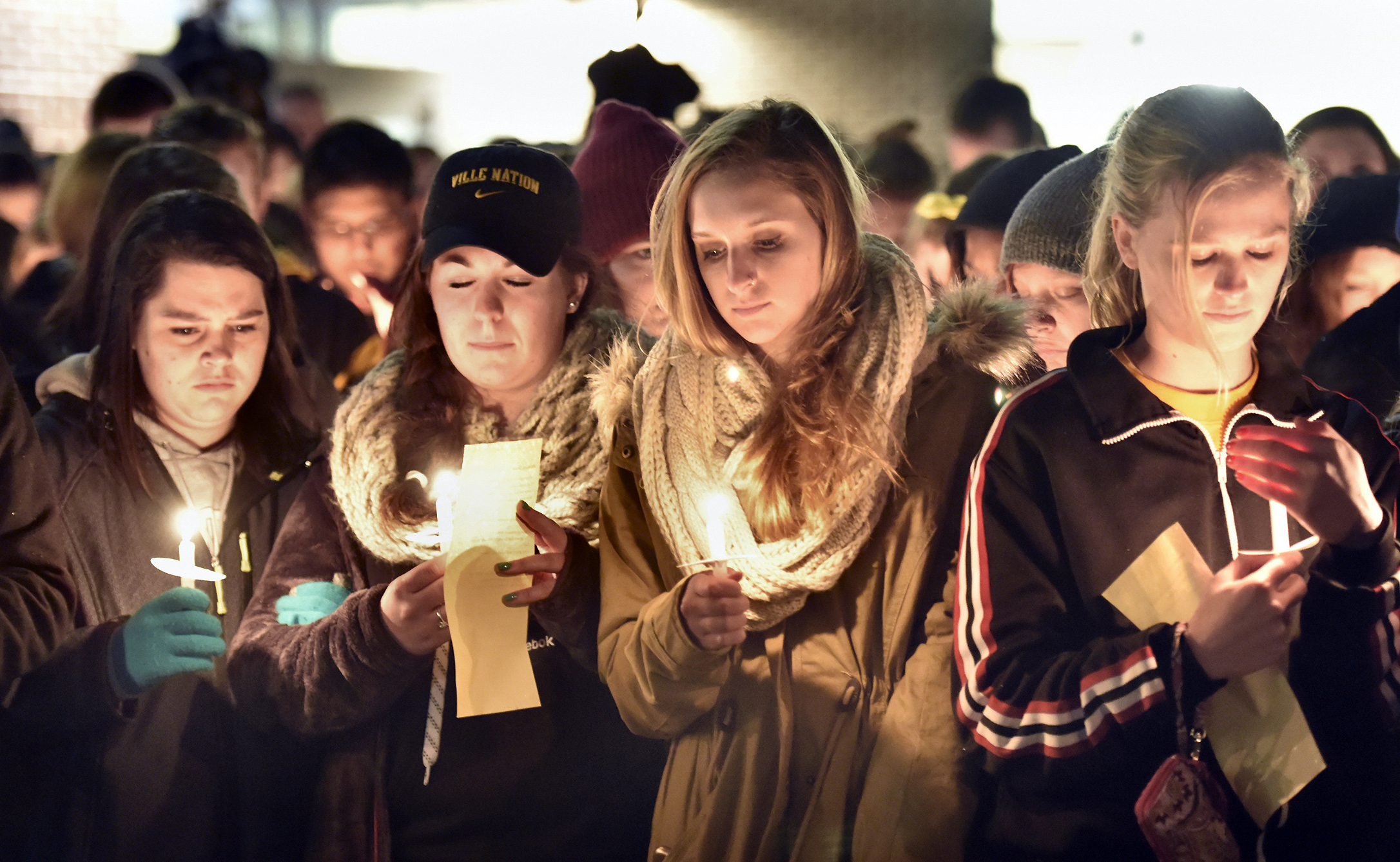 PHOTO: Millersville University students attend a candlelight vigil for slain student Karlie Hall in front of the Student Memorial Center, Feb. 9, 2015, in Millersville, Pa.