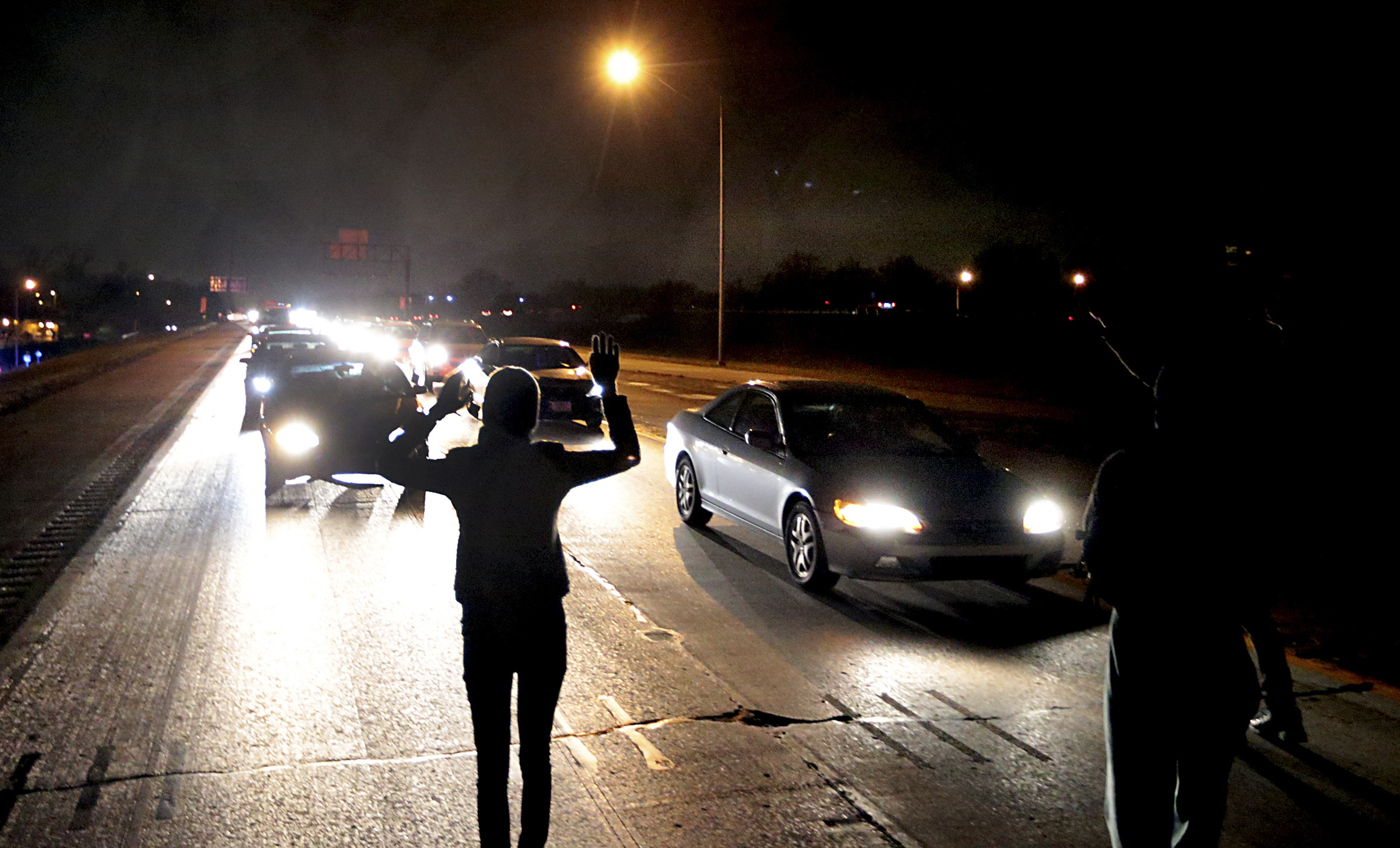 PHOTO: Protesters shut down an interstate at Airport Road, Dec. 24, 2014, in Berkeley, Mo.