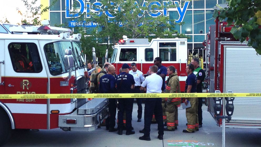 PHOTO: Firefighters stand outside the Discovery Museum in Reno, Nev., Sept. 3, 2014, after a demonstration malfunctioned.