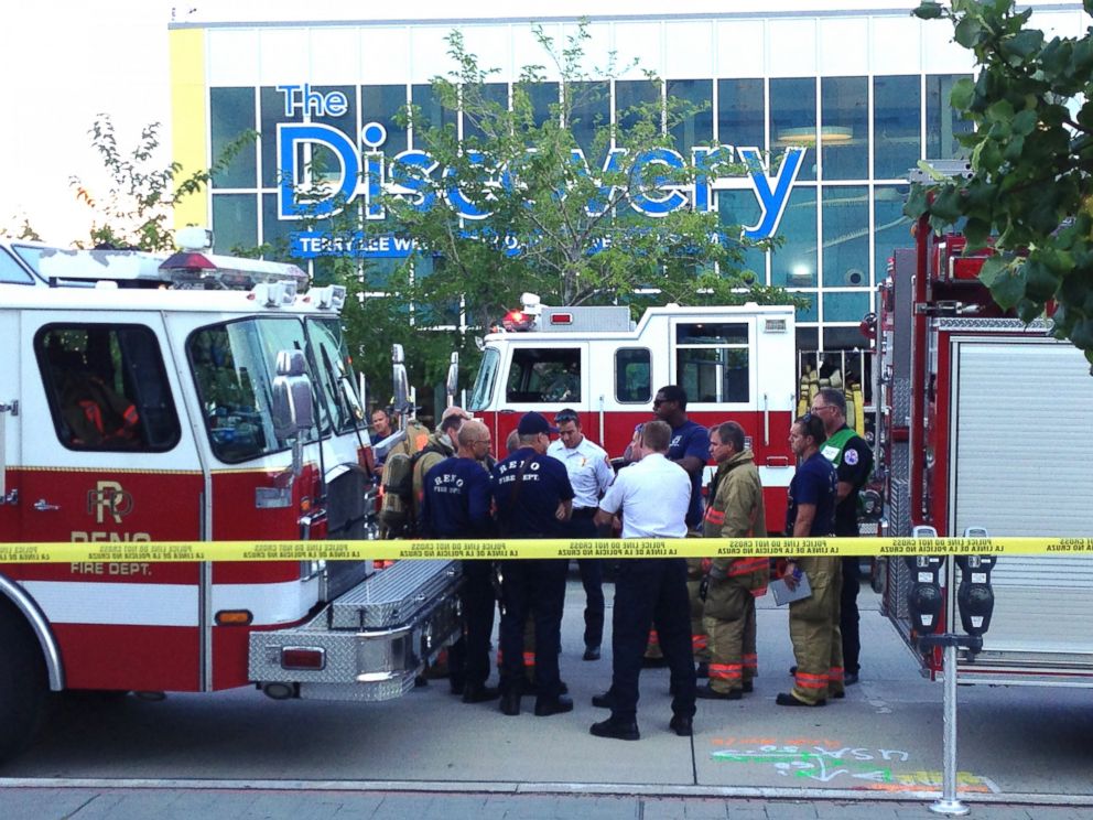 PHOTO: Firefighters stand outside the Discovery Museum in Reno, Nev., Sept. 3, 2014, after a demonstration malfunctioned.