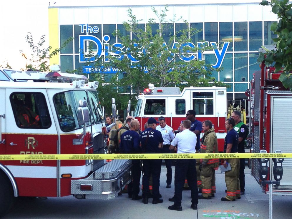PHOTO: Firefighters stand outside the Discovery Museum in Reno, Nev., Sept. 3, 2014, after a demonstration malfunctioned.