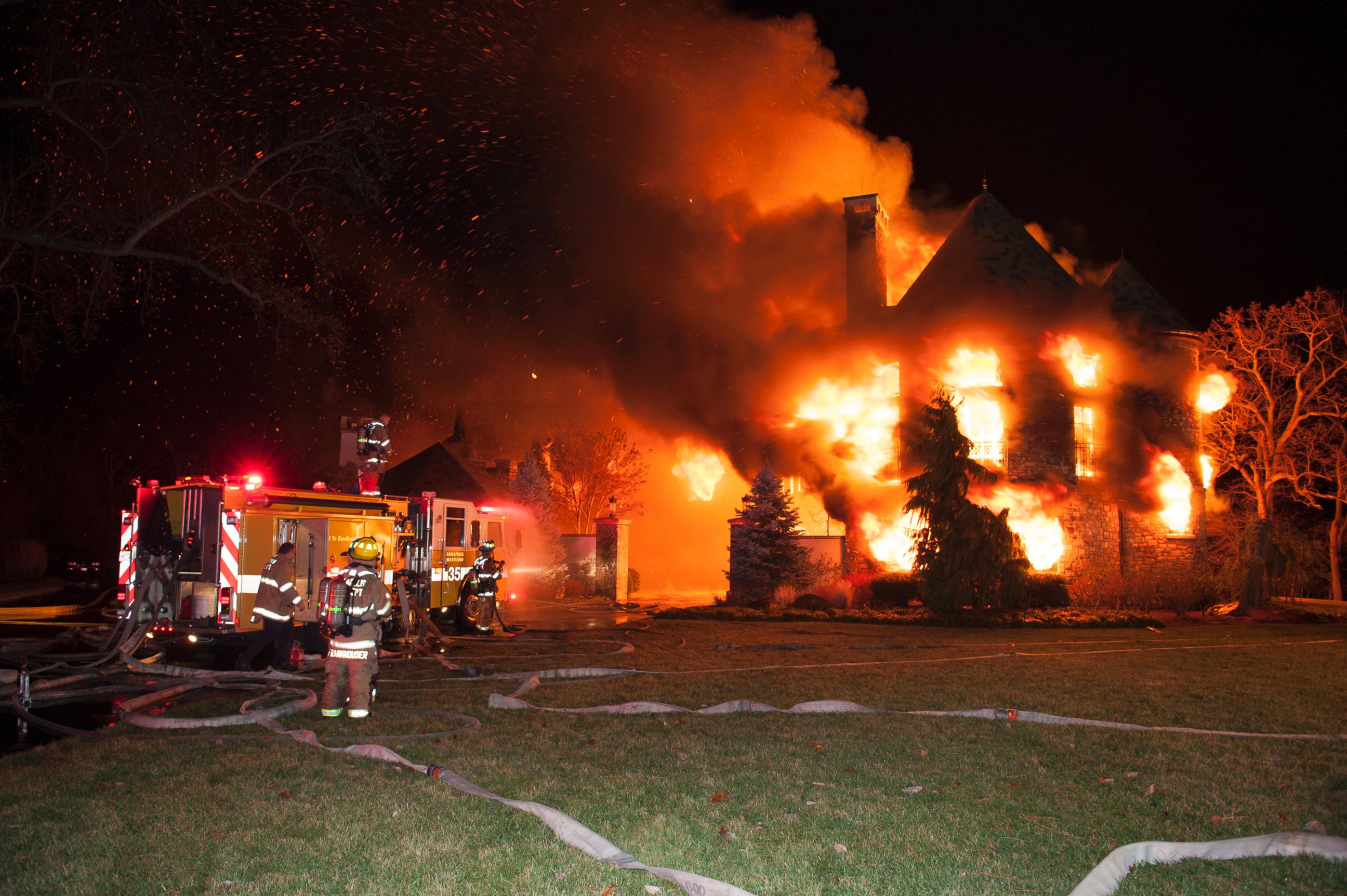 PHOTO: Firefighters battle a four-alarm fire at a home on Childs Point Road, Jan. 19, 2015, in Annapolis, Md.