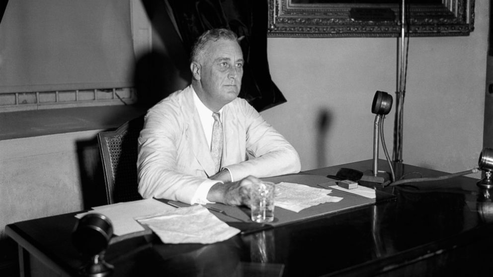 PHOTO: President Franklin D. Roosevelt appeals to the nation via radio for immediate enrollment of all employers under the blanket agreement to raise wages and create jobs, July 24, 1933, in Washington.  Within an hour 300 promises had been received.