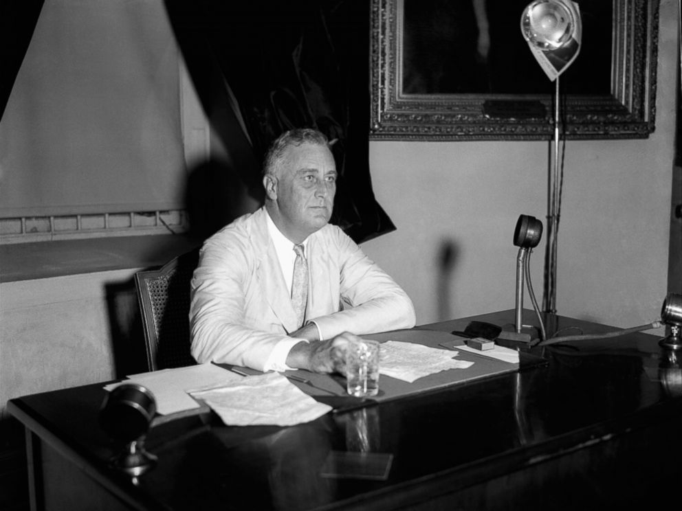 PHOTO: President Franklin D. Roosevelt appeals to the nation via radio for immediate enrollment of all employers under the blanket agreement to raise wages and create jobs, July 24, 1933, in Washington.  Within an hour 300 promises had been received.