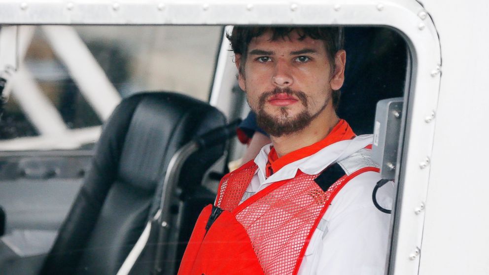 Nathan Carman arrives in a small boat at the US Coast Guard station in Boston, on Sept. 27, 2016. Carman spent a week at sea in a life raft before being rescued by a passing freighter.