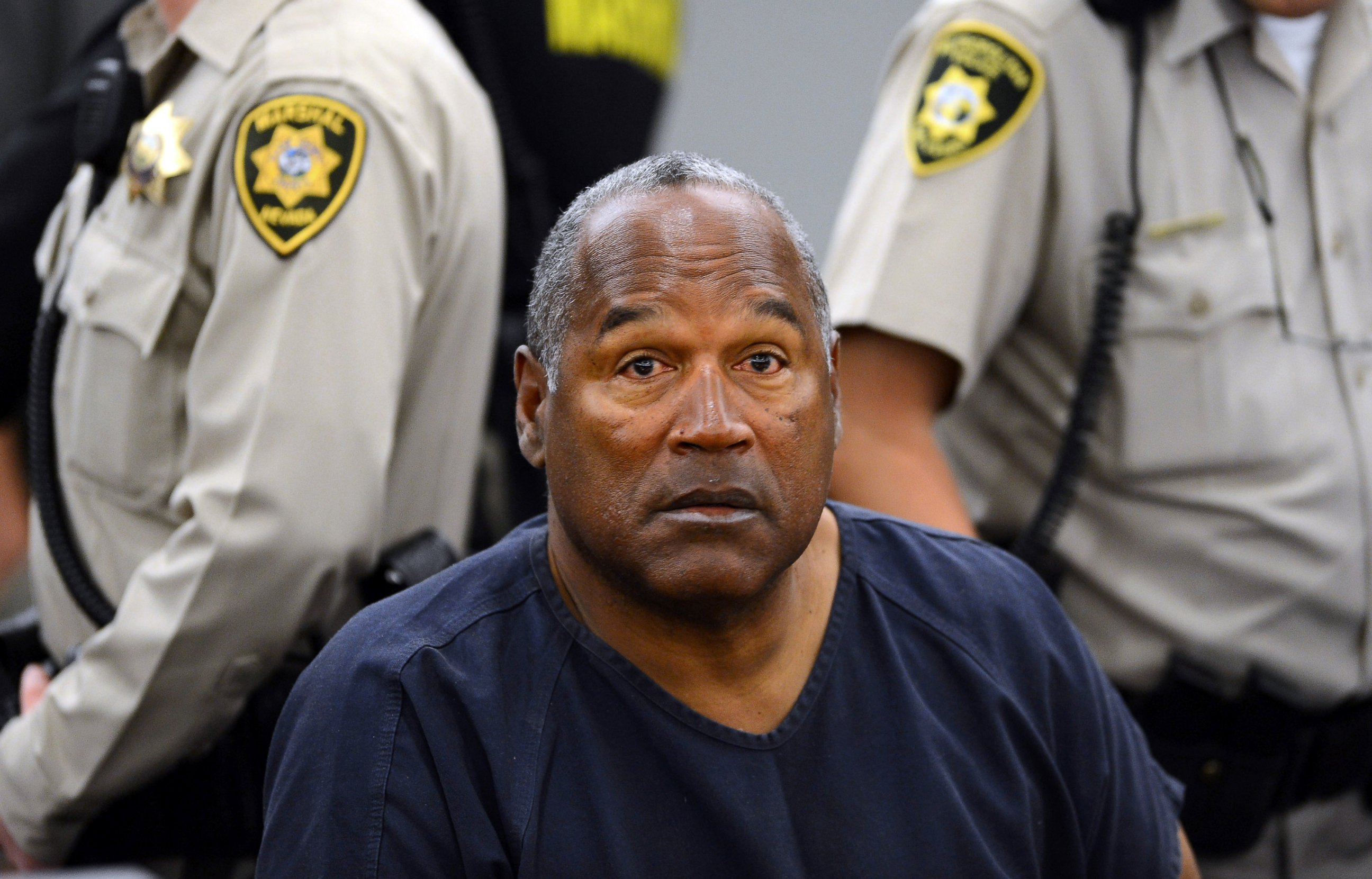 PHOTO: O.J. Simpson sits during a break on the second day of an evidentiary hearing in Clark County District Court in Las Vegas, May 14, 2013.  