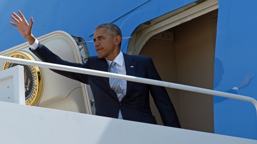 President Barack Obama waves from the top of the steps of Air Force One at Andrews Air Force Base in Md., July 7, 2016. Obama is traveling to Poland to attend a NATO summit and then on to Spain. 