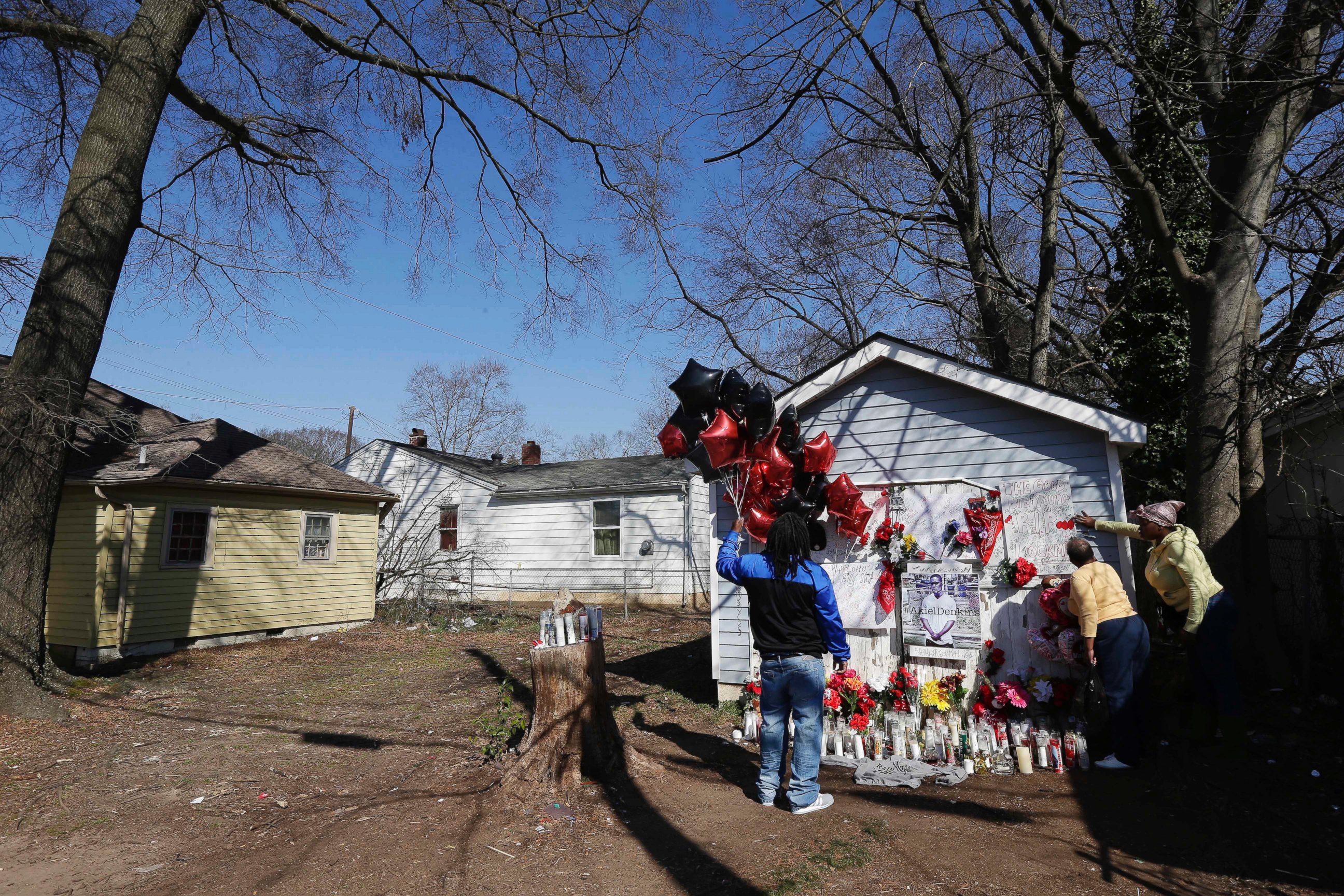 PHOTO: People gather at a makeshift memorial near the scene of a shooting in Raleigh, N.C.,March 1, 2016. Authorities say that a police officer fatally killed a man on Monday while trying to make an arrest for a felony drug charge.