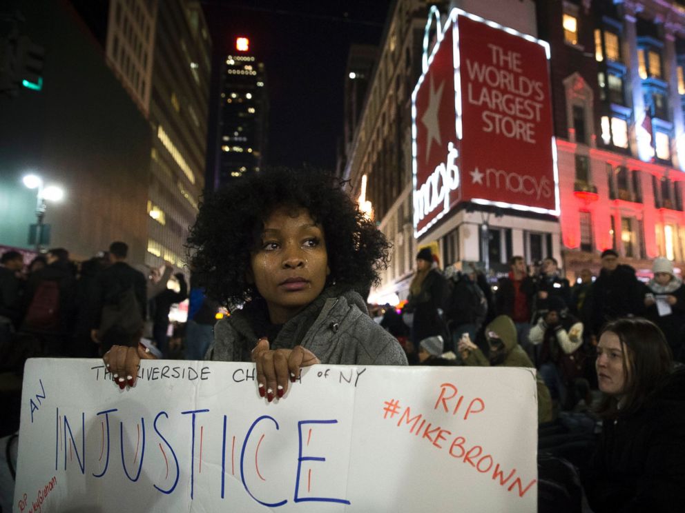 PHOTO: Protestor Rayyan Ali cries as her protest group occupies Herald Square Dec. 4, 2014, in New York, in response to a grand jurys decision not to indict the police officer involved in the death of Eric Garner.