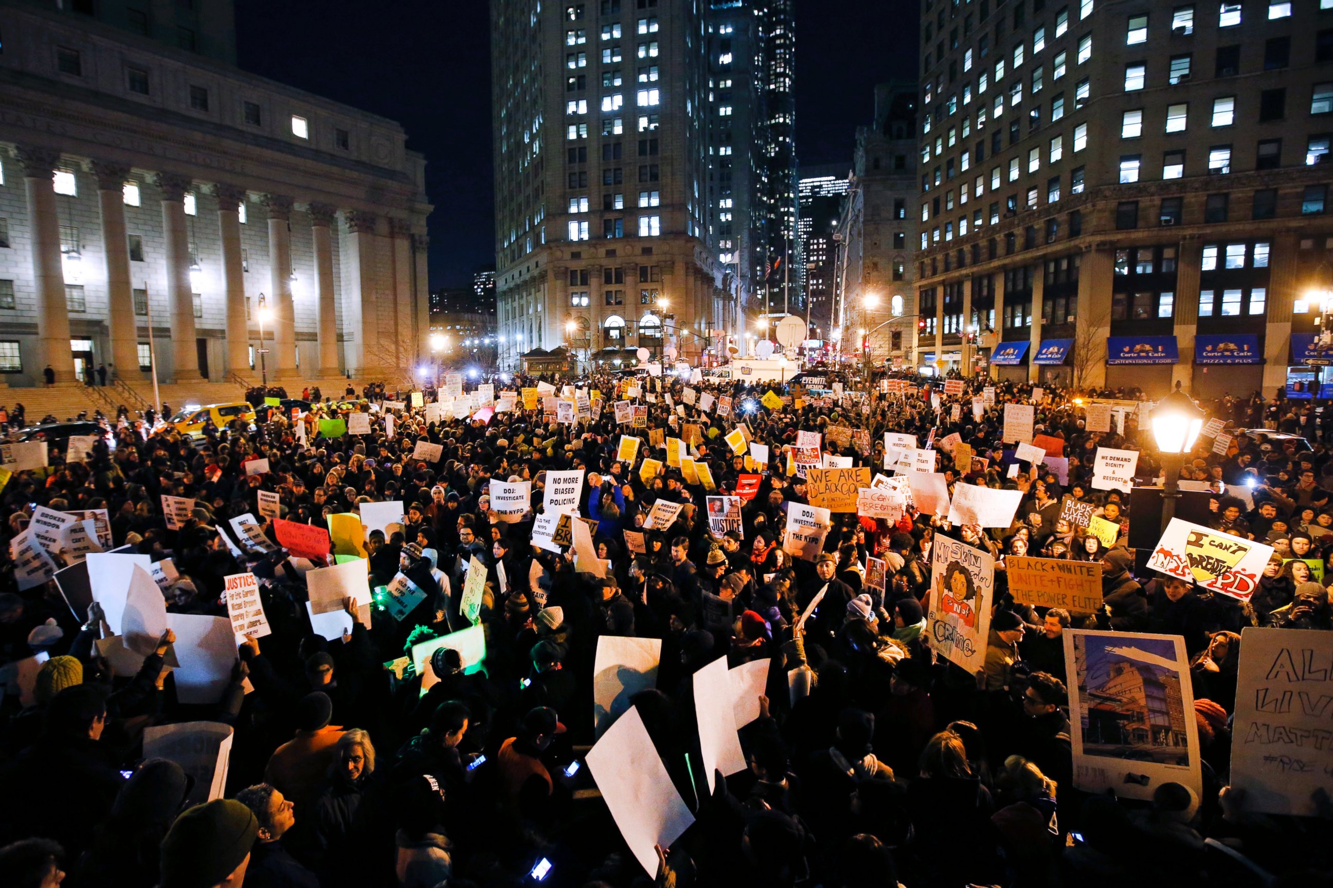 PHOTO: Protesters rally against a grand jury's decision not to indict the police officer involved in the death of Eric Garner in Foley Square, Dec. 4, 2014, in New York.